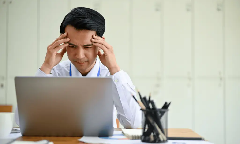 worker suffering from a bullying boss