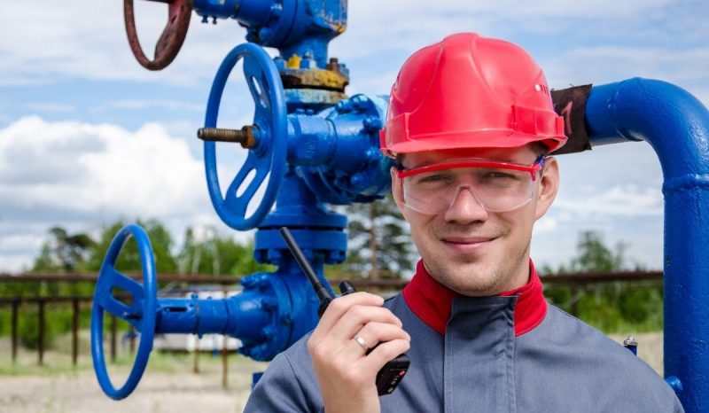 worker using helmet to protect his head from injury and concussion or brain damage